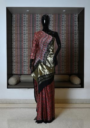 Pure model silk saree with Zari work border and Ajrakh work